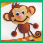 Felt craft monkey with googly eyes and a broad stitched smile on a white and yellow background.